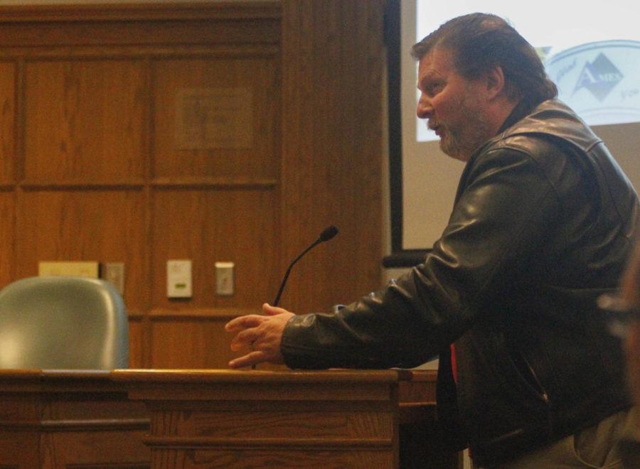 Scott Griffen, owner of Corner Pocket and Olde Main Brewery Co., asks a question concerning the Fats, Oils and Grease Program during the City Council meeting April 15. 