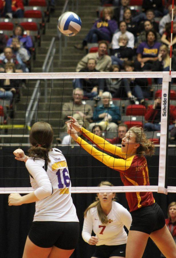 Ciara Capezio hits the ball in the third game of the volleyball tournament April 5 in Hilton Coliseum.