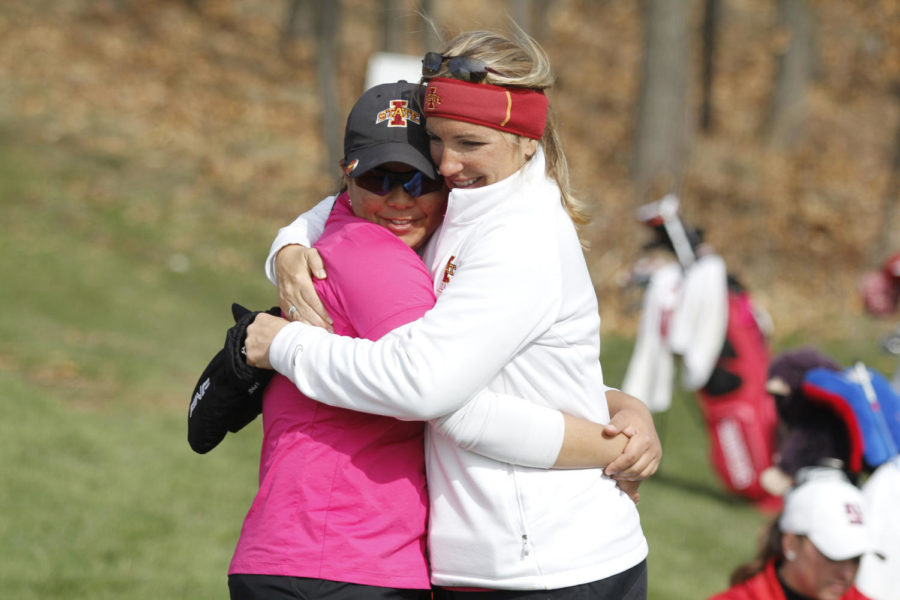 Head coach Christie Martins hugs Chonlada Chayanun after finishing round two of the 2013 Big 12 Womens Golf Championship at the Harvester on April 20, 2013, in Rhodes, Iowa.