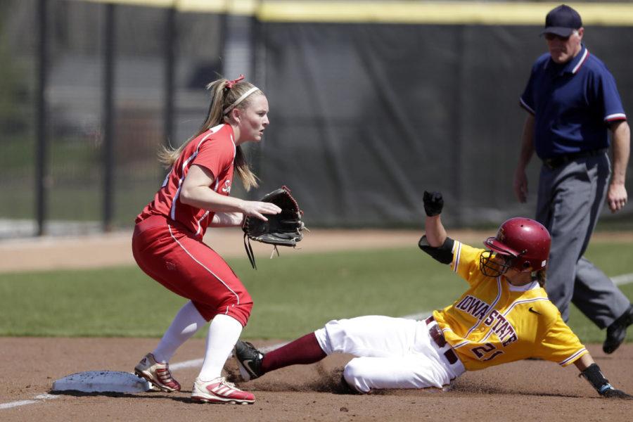 Senior outfielder Sarah Hawryluk slides into thrid base during Iowa States 6-5 win against South Dakota in the first game of their doubleheader on April 22 at the Cyclone Sports Complex.