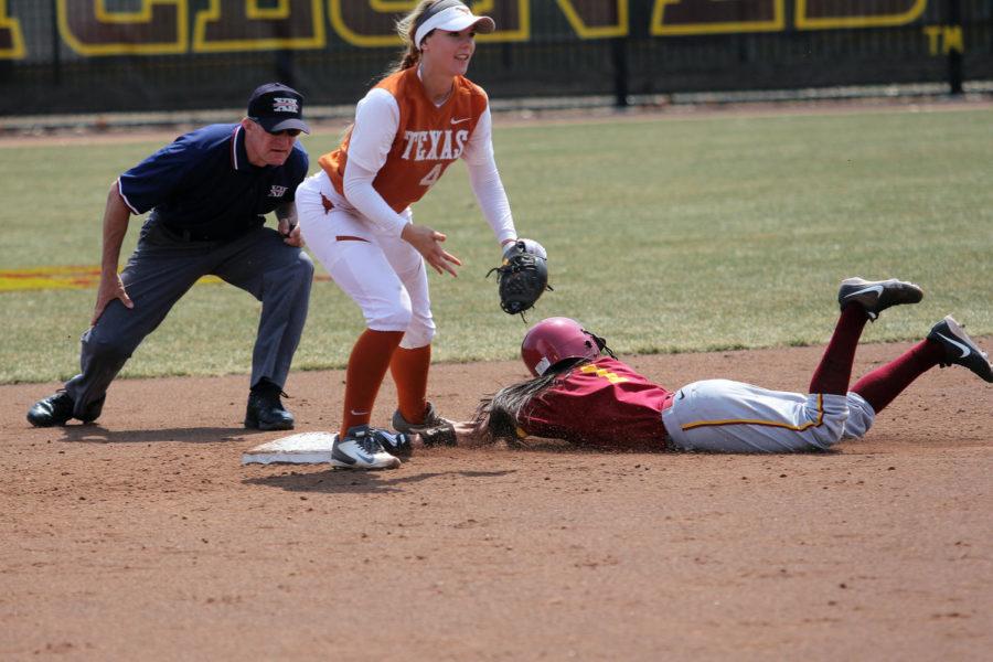 Sophomore infielder and outfielder Brittany Gomez slides into second base, and was called safe during Iowa States game against the Texas Longhorns. The Cyclones lost with a final score of 6-19.