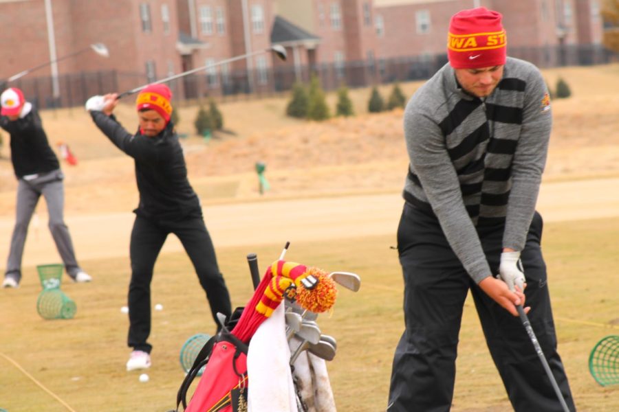 Sam Daley, junior from Wynnum, Australia, goes through practice shots as the Iowa State mens golf team begins to prepare for upcoming tournaments. 