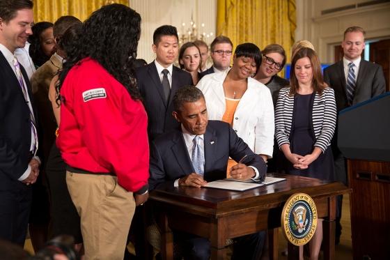 President Barack Obama signs a Presidential Memorandum on reducing the burden of student loan debt at the White House on June 9. Obama proposed a three-part plan to allow graduates to focus on their futures instead of heavy student debt.
