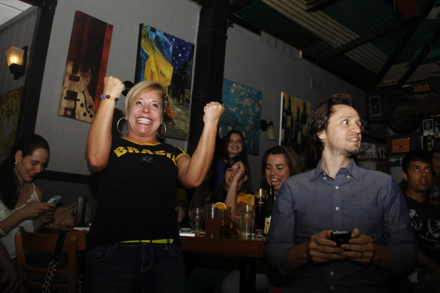 Fans at Cafe Beaudelaire react to the first goal scored by Brazil during the World Cup match between Brazil and Chile on June 28, 2014. The game ended in a score of 1-1, with Brazil winning after a 3-2 shootout.