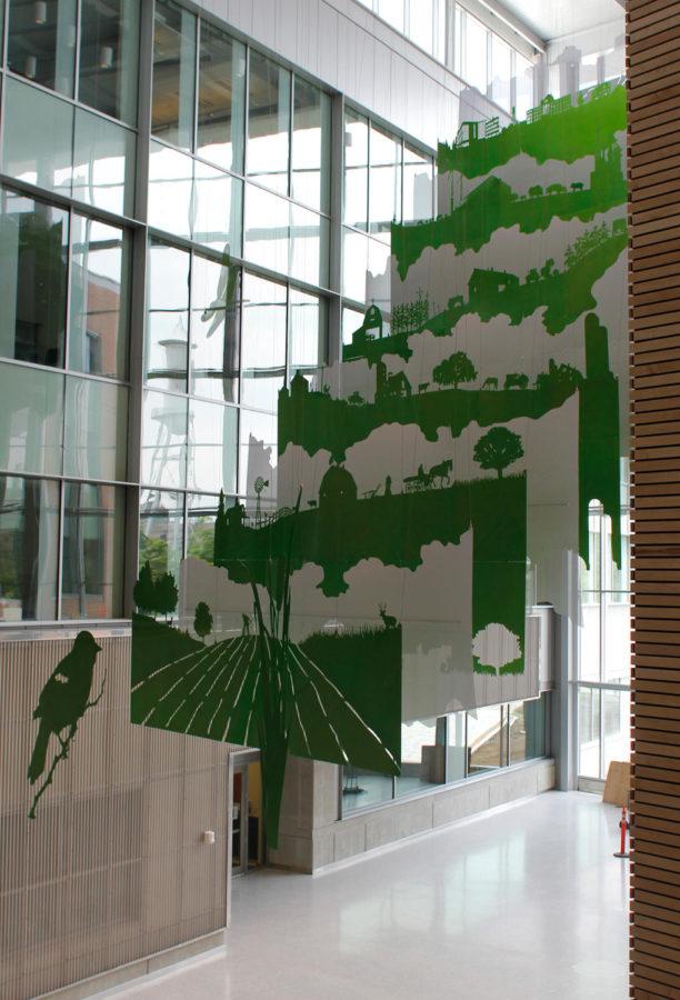 The new art installation in the Biorenewables Research Laboratory shows the progression of farming throughout history. The piece is by Ralph Helmick and titled Floating World.