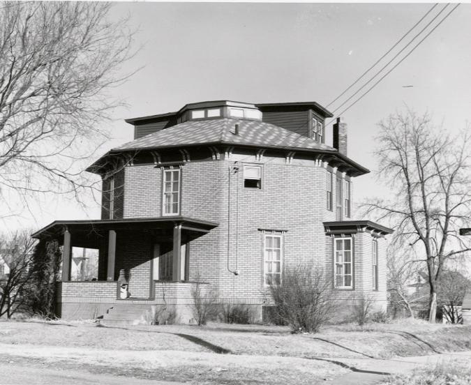 The octagon house in 1965 when it was used as an apartment for students. The Octagon Center for the Arts began in this 100-year-old house that was one of nine octagonal houses in Iowa. Though the house no longer stands, its name continues on Main Street.