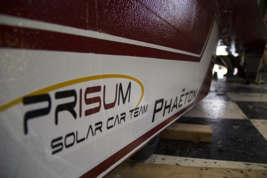 Members of Team PrISUm work on the solar car Phaeton in their garage July 8 in Sweeney Hall.