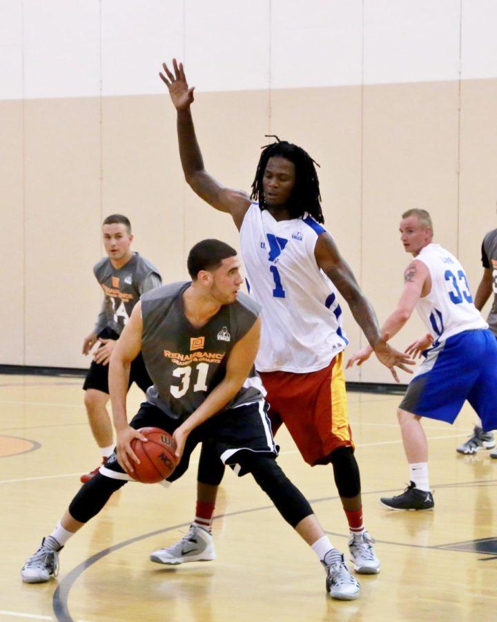 Jameel McKay guards Georges Niang during a game at the YMCA Capital City Basketball League in Des Moines last summer. 