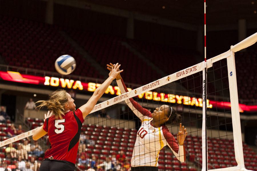 Senior Victoria Hurtt strikes the ball in the Cyclones game against the Nebraska Huskers April 19, 2014 at Hilton Coliseum. The Cyclones lost 4-0. 