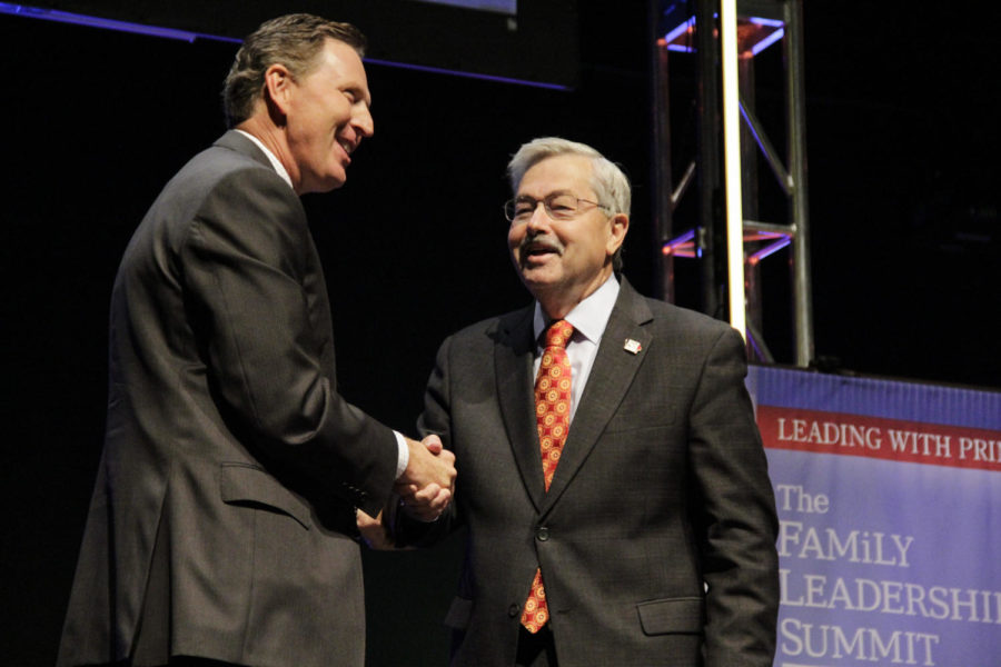 Iowa Gov. Terry Branstad shakes hands with Bob Vander Plaats, president and CEO of The Family Leader, at the 2014 Family Leadership Summit on Aug. 9 at Stephens Auditorium.