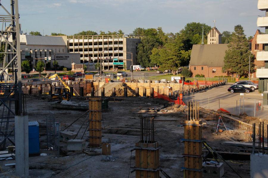 Construction in the former location of First National Bank on Lincoln Way across from the Memorial Union continues on Aug. 25. A new luxury student apartment building will be built in the location.  Student housing is at an all-time high demand, requiring the construction of new student apartments.