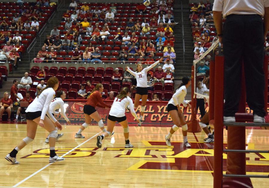 Sophomore outside hitter Ciara Capezio attacks the ball during the Cardinal and Gold Scrimmage on Aug. 23.
