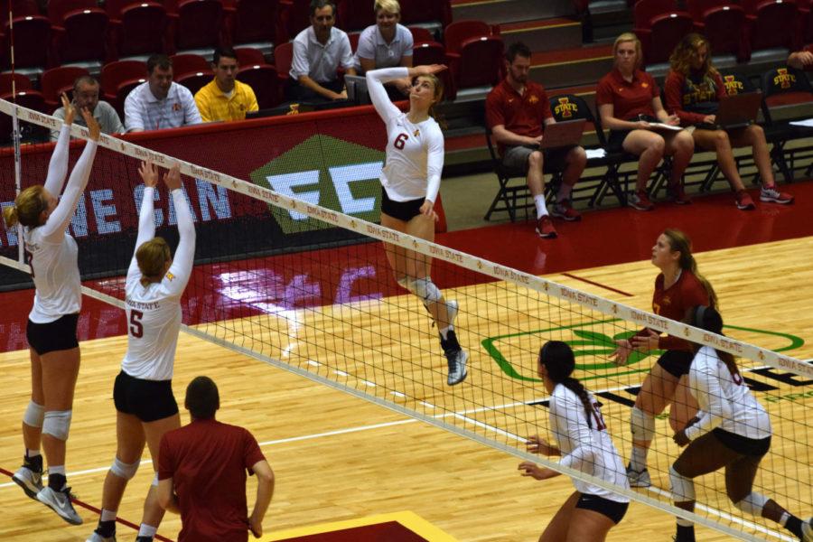 Freshman outside hitter and middle blocker Alexis Conaway goes for a kill during the Cardinal & Gold scrimmage on Aug. 23.