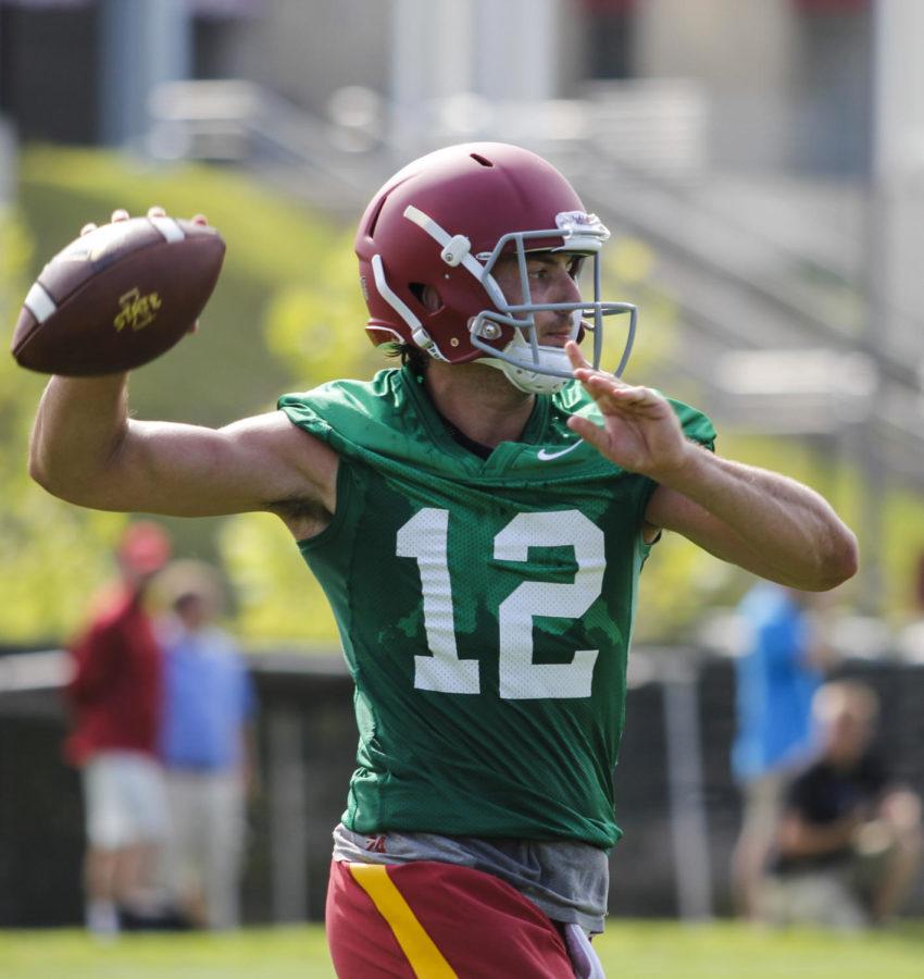 Redshirt junior quarterback Sam Richardson passes the ball at the first fall practice on Aug. 4, 2014.