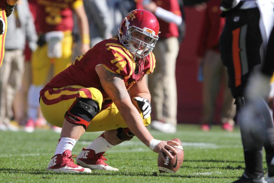 Redshirt junior offensive lineman Tom Farniok waits for the rest of the offensive line to get into formation during the game against Oklahoma State on Oct. 26. The Cyclones lost to the Cowboys 58-27.