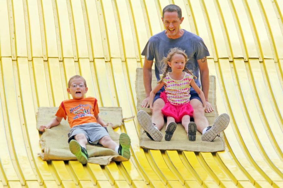 The giant slide, an annual tradition at the Iowa State Fair, allows attendees to slide down on a piece of carpet and race family and friends. The Iowa State Fair ran from Aug. 7 to 17 in Des Moines.