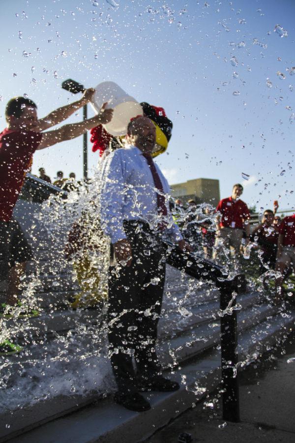ISU President Steven Leath was challenged by Jacob Schaefer, senior in construction engineering, to the ALS ice bucket challenge. Leath completed the challenge at Destination Iowa State on Aug. 21 when Cy dumped a bucket of ice water on him.