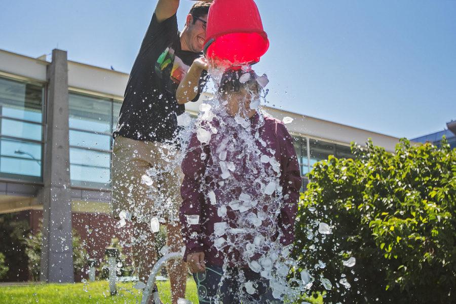 Gloria Starns, senior lecturer of mechanical engineering, accepts her ice bucket challenge that a friend issued. Starns dedicated her challenge to two students father who passed away due to ALS.