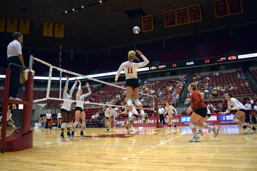 Sophomore outside hitter Ciara CapezioCQ goes for a kill during the Cardinal and Gold Scrimmage on August 23.