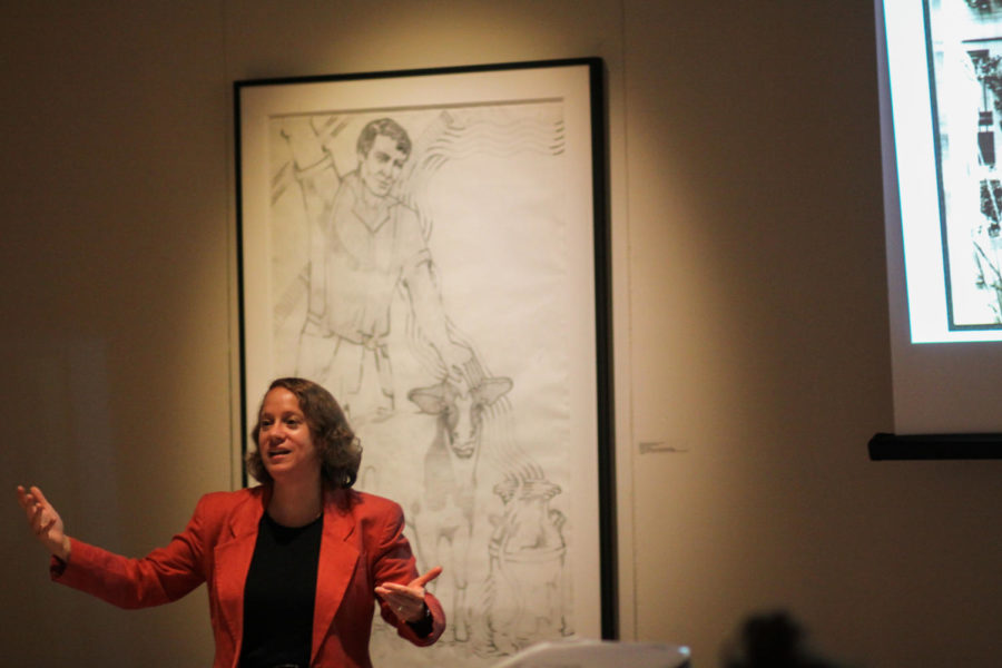 Amy Bix, associate professor of history, talks about how the womens suffrage movement is reflected in works of art Sept. 25 at the Brunnier Art Museum.
