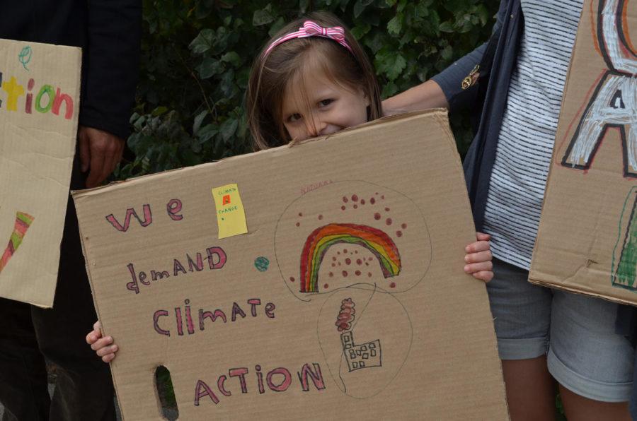 Blair Calhoun, 5 years old from Ames, participates in the Peoples Climate Rally on Sept. 21. 