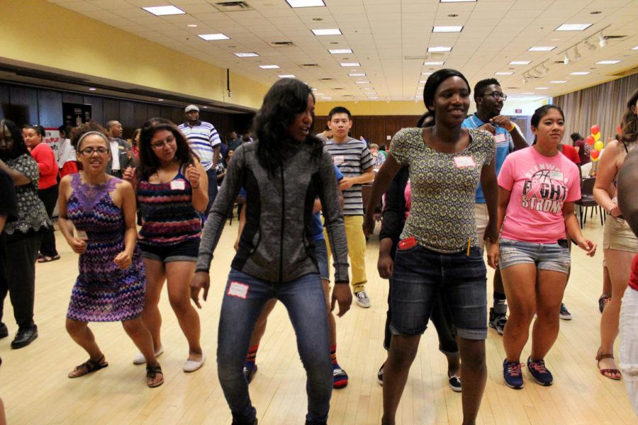 Students+learn+dances+step-by-step+from+an+instructor+during+the+Jump+Start+event+hosted+by+Multicultural+Student+Affairs+on+Sept.+2+in+the+Sun+Room+of+the+Memorial+Union.