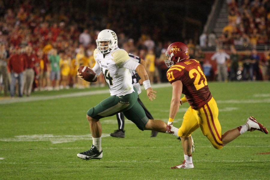 Redshirt sophomore linebacker Luke Knott chases down Baylor quarterback Bryce Petty. Iowa State fell to the No. 7 Baylor Bears with a final score of 49-28.