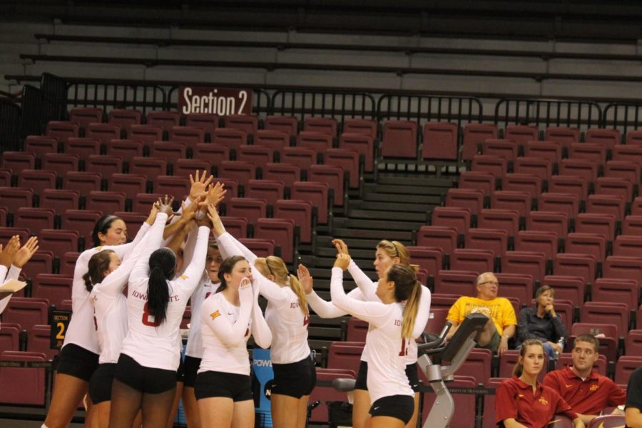 The Iowa State bench does a cheer after every ISU block in the game against Tulsa on Sept. 13.
