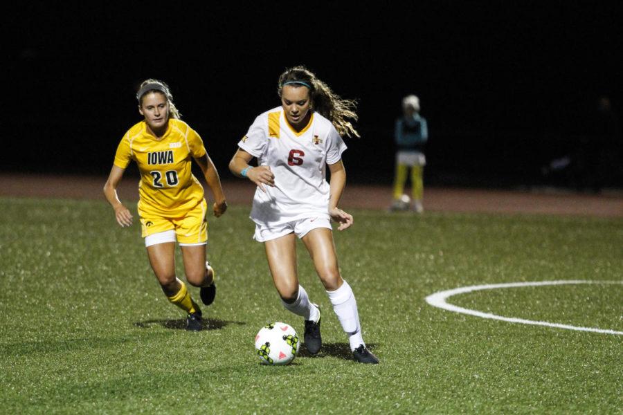 Sophomore defender Madi Ott dribbles the ball away from Iowa States goal during the Cy-Hawk Series game against Iowa on Sept. 5. The Cyclones defeated the Hawkeyes 2-1.