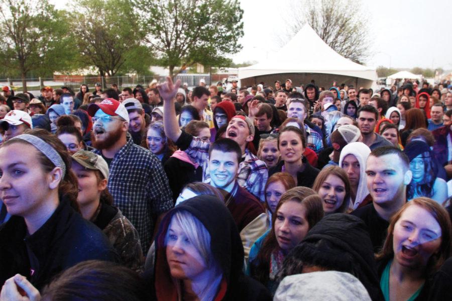 Fans sing along to country singer Craig Campbells set during Live @ Veishea in the Molecular Biology parking lot on Saturday, April 21. Campbell is best known for his hit singles Family Man and Fish. 
