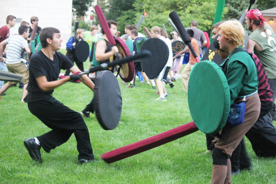 Students of the Tir Asleen Medieval Combat Society practice outside Parks Library on Aug. 26.