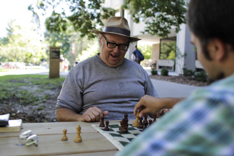 David Skaar sits at a picnic table between Carver and Beardshear halls for a little while every couple of days since last fall, inviting students to play and learn about chess. Skaar first learned how to play chess in 1963 when his brother taught him to play. Skaar spends his time on campus spreading his positivity and sharing his philosophies to everyone who will listen.