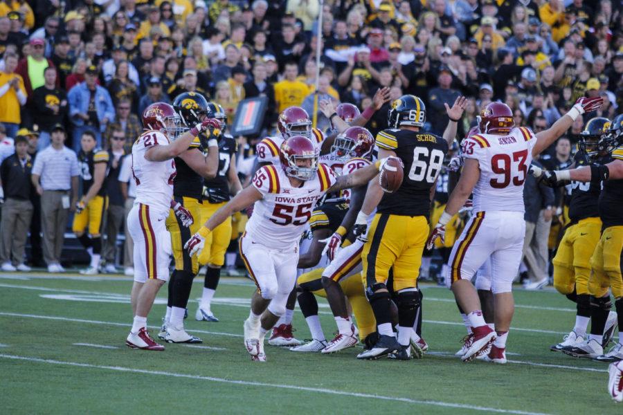 Senior+linebacker+Jevohn+Miller+picks+up+and+runs+with+a+loose+ball+during+the+Iowa+Corn+Cy-Hawk+Series+game+against+Iowa+on+Sept.+13+at+Kinnick+Stadium+in+Iowa+City.+The+Cyclones+defeated+the+Hawkeyes+20-17.