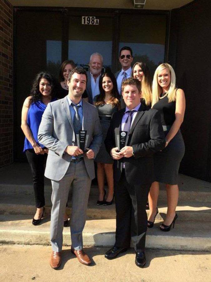 Joshua+Mayes+and+Chad+Smith+hold+their+award+with+their+inside+sales+team+at+MSI+Supply.