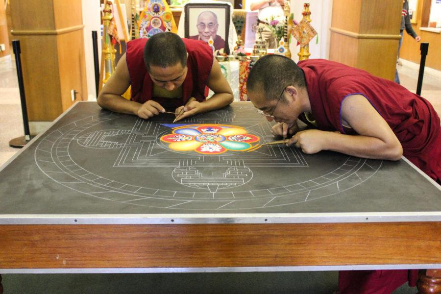 The Mystical Arts of Tibet showcased 10 monks working on a sand mandala painting Sept. 22. They will continue to work on the painting and sell Buddhist goods through the rest of the week.