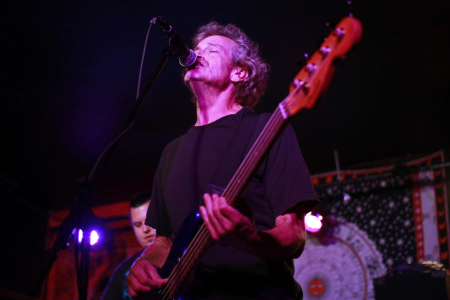 Cris Kirkwood, bass guitar and backing vocals of The Meat Puppets, performs at DGs Tap House as part of the Maximum Ames Music Festival on Sept. 26.