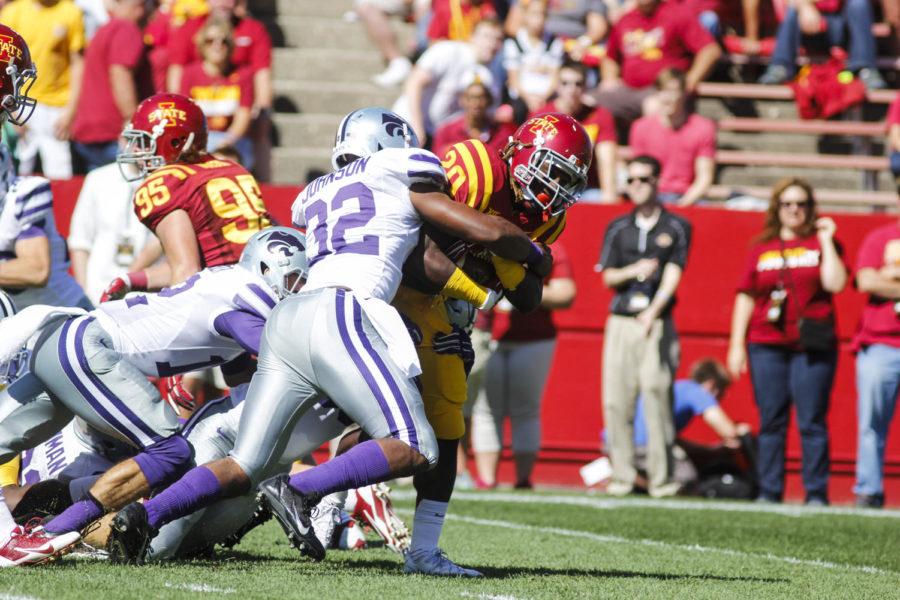Redshirt junior running back DeVondrick Nealy pushes through Kansas States defensive line Sept. 6 at Jack Trice Stadium. The Cyclones led for much of the game but couldnt maintain their lead in the second half, and the Wildcats won 32-28. Nealy had 38 rushing yards for the Cyclones.