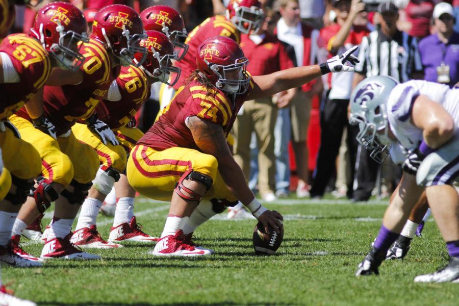 Redshirt senior center Tom Farniok and the offensive line get ready for play during the game against Kansas State on Sept. 6 at Jack Trice Stadium. The Cyclones led for much of the game but couldnt maintain their lead in the second half, and the Wildcats won 32-28.