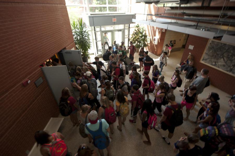 Students file into the Hoover Hall auditorium on the first day of classes on Aug. 25, 2014.