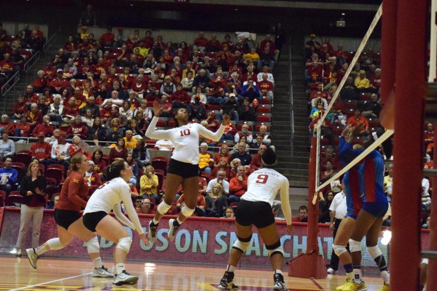 Senior outside hitter Victoria Hurtt goes for a kill against Kansas on Oct. 21. The Cyclones won the match in five sets.