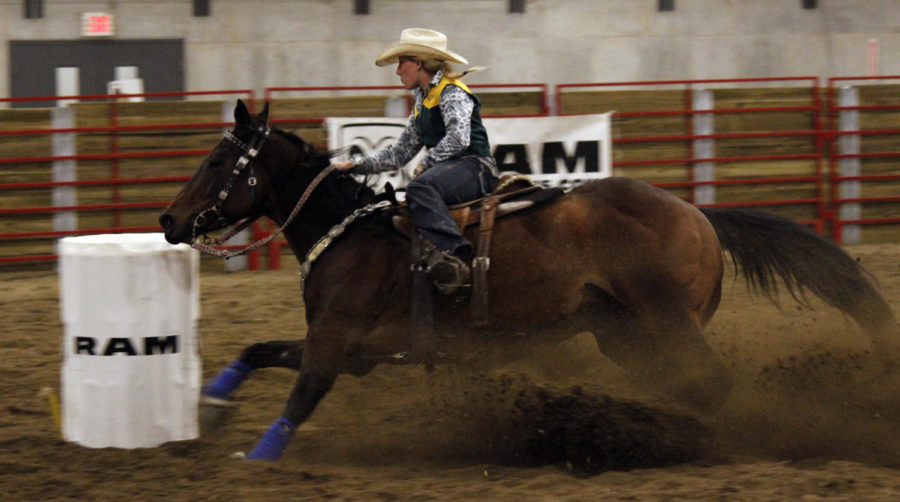 Members of collegiate rodeo teams from across the Great Plains Region of the National Intercollegiate Rodeo Association competed Oct. 4 in the 2014 Cyclone Stampede Rodeo. The rodeo featured events such as team roping, breakaway roping, tie down roping, barrel racing, bronc riding, bull riding, goat tying and steer wrestling. The event was held indoors for the first time at the Jeff and Deb Hansen Agriculture Student Learning Center.