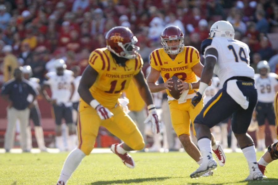 Redshirt+junior+quarterback%2C+Sam+B.+Richardson+looks+for+an+open+receiver+near+the+endzone+in+the+second+half.+The+Cyclone%E2%80%99s+ended+their+drive+in+the+third+quarter+with+a+23-yard+pass+from+Richardson+to+redshirt+junior+wide+receiver+Tad+Ecby+for+a+touchdown.+Iowa+State%E2%80%99s+homecoming+game+against+Toledo+on+Oct.+11%2C+ended+in+a+victory+for+the+Cyclones%2C+37-30.
