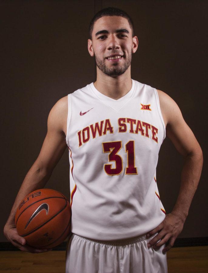 Junior Georges Niang poses for photos at mens basketball media day on Wednesday at Sukup Basketball Complex.