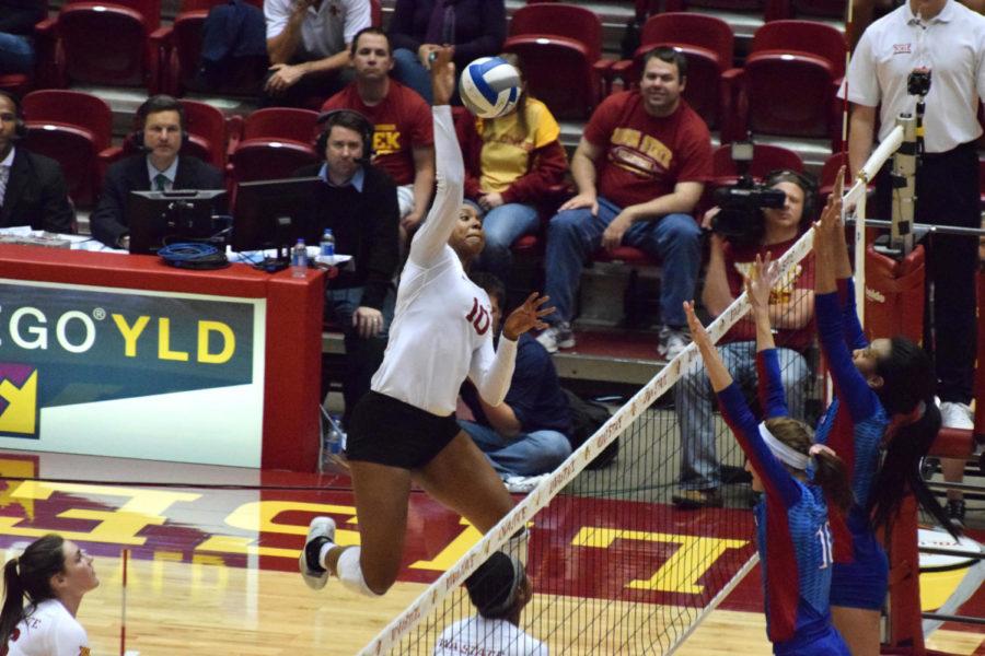 Senior outside hitter Victoria Hurtt goes for a kill against Kansas on Oct. 22. Hurtt finished the match with 13 total kills.