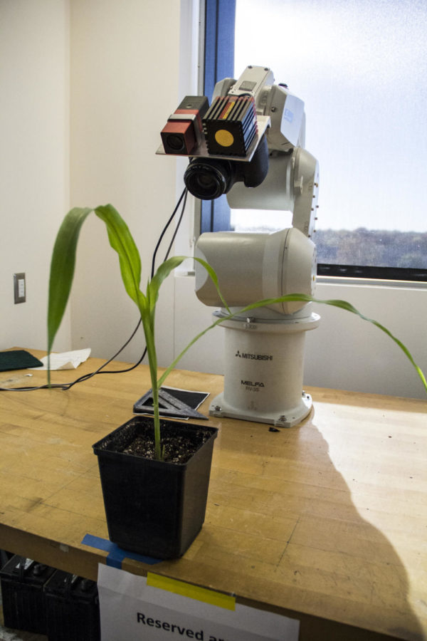 Within+three+years%2C+a+team+of+ISU+faculty+members+hope+to+control+several+different+growing+environments+and+collect+plant+growth+data+with+a+robotic+arm+on+a+rover.