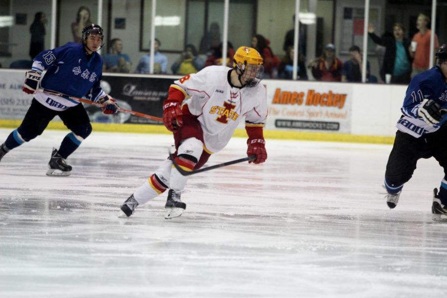 Freshman+Zack+Johnson+skates+after+the+puck+when+a+HC+Harbin+player+had+possession+of+it.+The+Cyclones+beat+Harbin+8-0+on+Sept.+26.%C2%A0