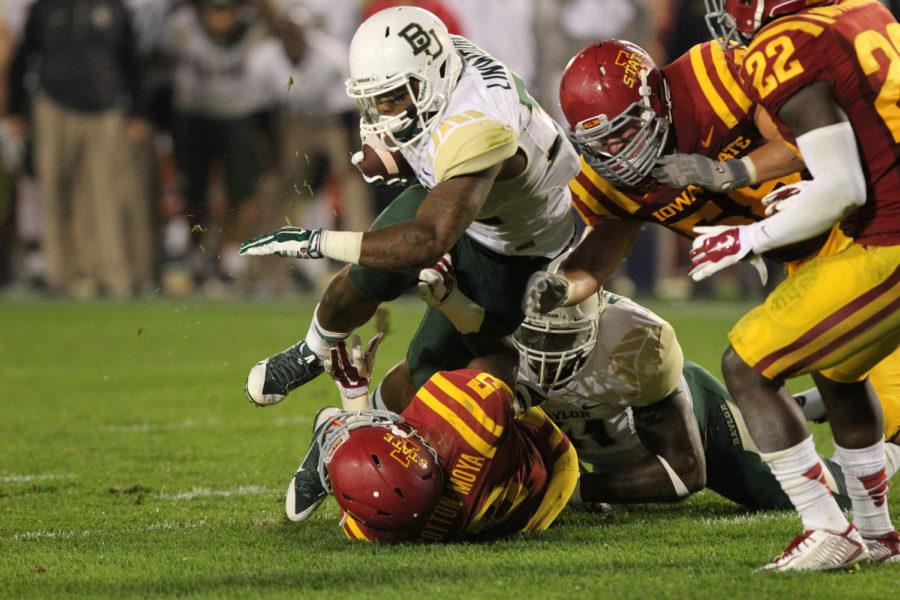 Restart freshman defensive back Kamari Cotton-Moya takes down Baylor running back Shock Linwood. Iowa State fell to the No. 7 Baylor Bears with a final score of 49-28. 