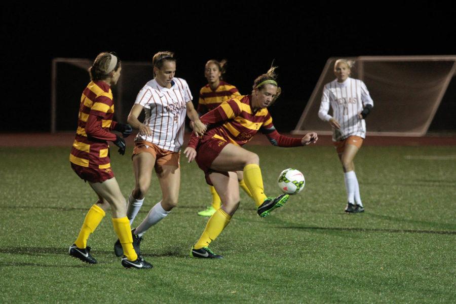 Haley Albert tries to control the ball during the soccer game against Texas on Oct. 3. The team improved from its 2-0 loss to Baylor from earlier in the week, but fell to Texas 1-0 during a cold and windy night at the Cyclone Sports Complex.