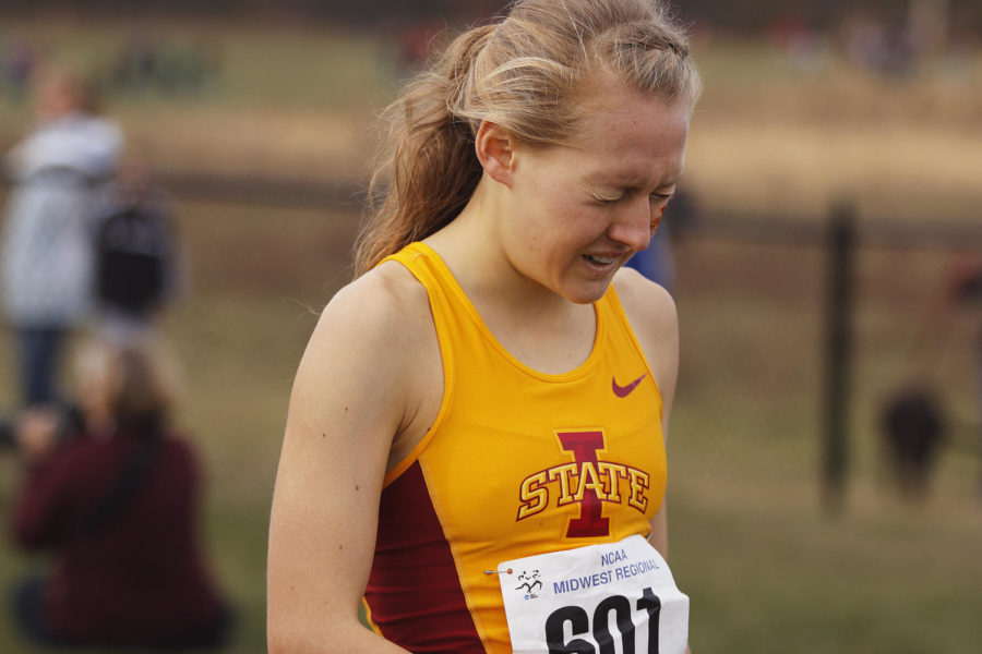 Freshman Bethanie Brown tears up after crossing the finish line of the Midwestern Regional cross-country meet on Friday, Nov. 15, 2013, in Ames. The Cyclones finished the meet with 39 points, winning their fourth-consecutive Midwest regional meet. They will all be competing at the NCAA Championships on Nov. 23, 2013, in Terre Haute, Ind. 