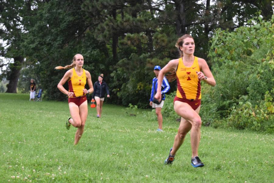 Redshirt sophomores Taylor McDowell, left, and Julie Wiemerslage race toward the finish line at the Bulldog 4K Classic on Aug. 30 in Des Moines. 